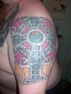 celtic cross on shoulder